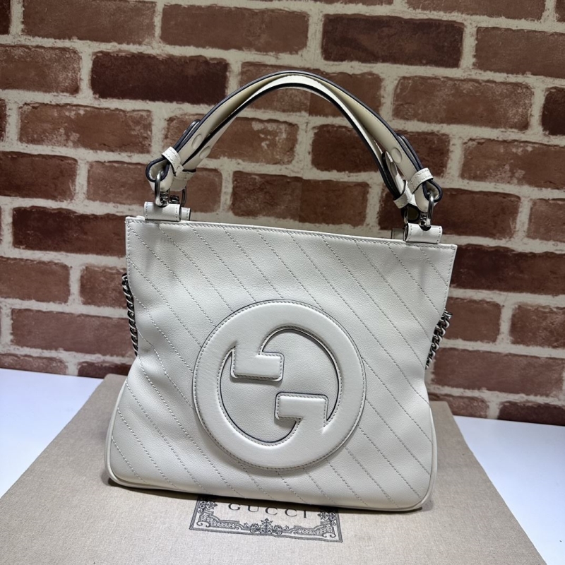 G*u*i top handle bags